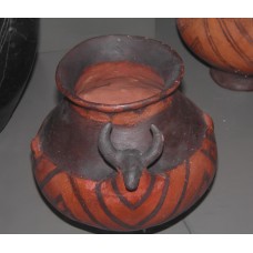 Burial clay vessels with bullheads
